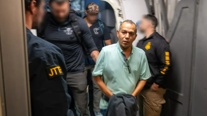 Khalid Ahmed Satary is escorted after his capture in connection with an alleged $547 million Medicaid fraud scheme. Photo: Federal Bureau of Investigation New Orleans / Used with Permission